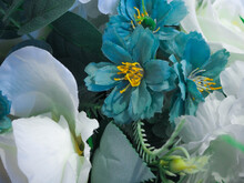 Artificial Flowers In White, Blue And Red 
