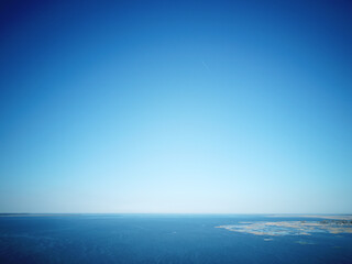 Sticker - Beautiful view of the horizon of the sky and the blue ocean on a sunny summer day