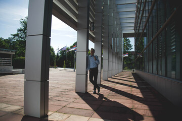 Sticker - Handsome Bosnian Caucasian man in a suit and bow tie, posing outdoors