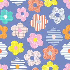 Naive childish textured flower in vibrant rainbow colours vector seamless pattern. Summer floral Scandinavian nursery print design
