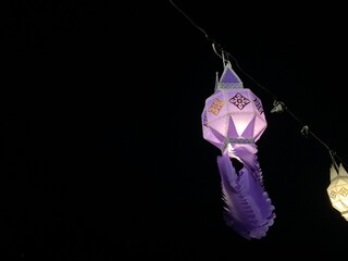 Purple lanterns hanging for decoration in the festival