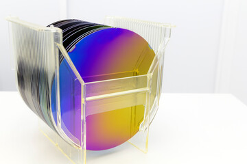 Poster - Silicon Wafers in plastic storage box in clear room of semiconductor foundry.