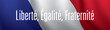 Flag of France with Liberte, egalite, fraternite patriotic motto.