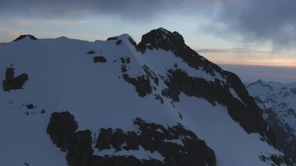 Wall Mural - aerial dramatic north cascade mountains winter sunset