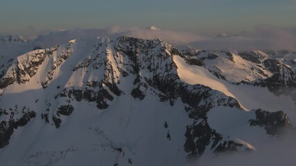 Wall Mural - aerial dramatic north cascade mountains winter sunset