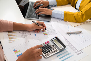 Fototapete - accountant  pointing on laptop for meeting team in office room. concept finance and accounting