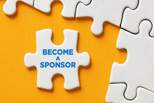 Become A Sponsor Message On A Puzzle Piece Apart Form The Assembled Pieces. Financial Sponsorship Support Or Charity Donation