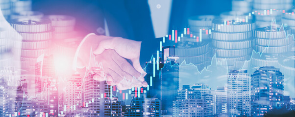 double exposure - close up businessman handshake to business partner and trade agreements and deals 