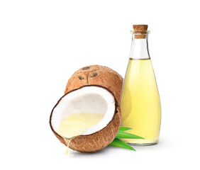 Wall Mural - Coconut oil dripping from coconut cut in half with bottle  isolated on white background.