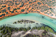 Aerial view of coast and tracks of Little Lagoon Creek around Denham at Shark Bay, Western Australia