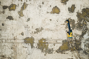 Excavator at a construction site. Aerial view of construction, Poland.