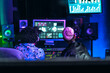 © Alessandro Biascioli - Young audio engineer people having fun working with mixer sound panel control in music recording studio
