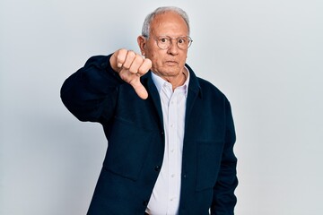 Sticker - Senior man with grey hair wearing casual style and glasses looking unhappy and angry showing rejection and negative with thumbs down gesture. bad expression.