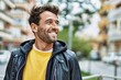 © Krakenimages.com - Handsome hispanic man with beard smiling happy outdoors