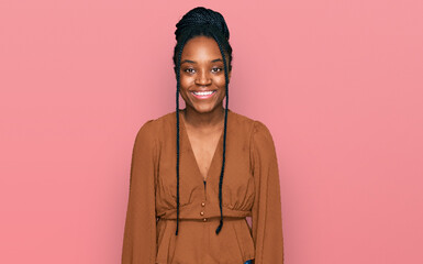 Poster - Young african american woman wearing casual clothes with a happy and cool smile on face. lucky person.