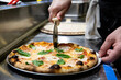 © Stacy Howell - Fresh basil on pizza