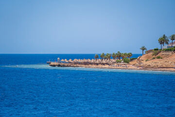 Wall Mural - Red sea coast and beautiful beach with on tropical resort in Egypt, Africa