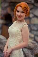 Poster - Vertical shot of a Caucasian female smiling at the camera