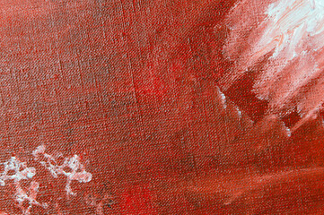 abstract creative background: white and red blurred stains of colored primer when toning the canvas, temporary object.