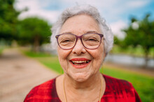 Joyful Senior Lady In Glasses Laughing. Latin American Woman. Brazilian Elderly Woman.
