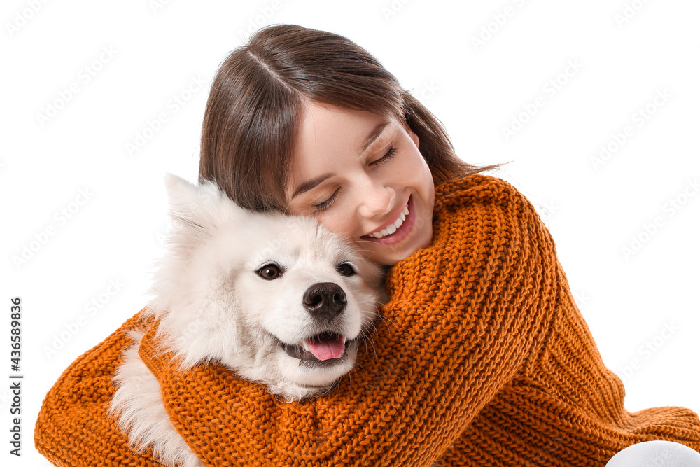 Beautiful woman with cute dog on white background