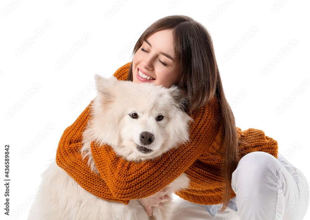 Beautiful woman with cute dog on white background
