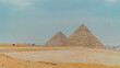 Panorama of the pyramids in Giza, Egypt on a foggy day