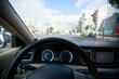 © lzf - Driving car on city street