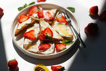 Wall Mural - Healthy food breakfast strawberry toast with butter cream