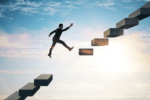 Overcome Difficulty Concept With Businessman Jumps Over Broken Stairs On Bright Sky Background.
