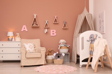 Poster - Baby room interior with stylish furniture and comfortable crib