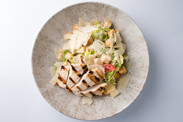 Poster - Healthy organic Chicken Caesar Salad with grilled chicken on plate