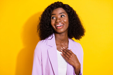 Poster - Photo of young happy beautiful charming afro businesswoman look copyspace hear compliment isolated on yellow color background