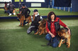 © Svitlana - Gorgeous dogs and tree instructors during the training session