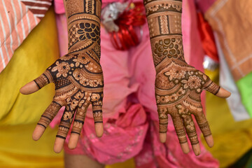 Wall Mural - Indian bride showing hands mehndi design