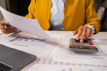 Fototapete - accountant  pointing on laptop for meeting team in office room. concept finance and accounting