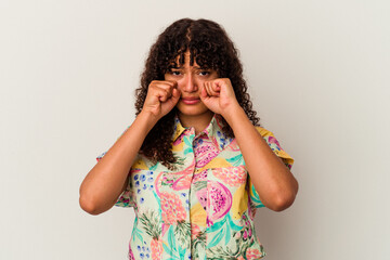 Wall Mural - Young mixed race woman isolated on white background whining and crying disconsolately.