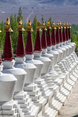 Wall Mural - White buddhist stupa or pagoda in tibetan monastery near village Leh in ladakh, noth India