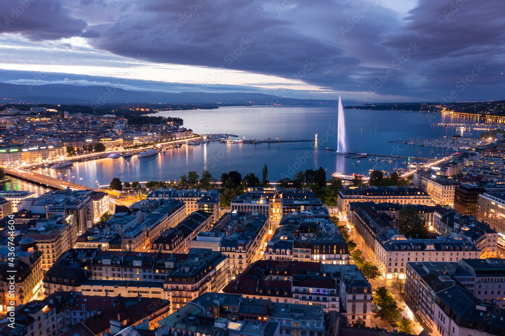 Aerial  night view of Geneva city water fountain in Switzerland - obrazy, fototapety, plakaty 