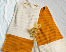 Orange And White Jumpsuits On White Canvas With Decorative Corsage