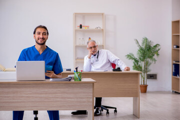 Two doctors working in the clinic