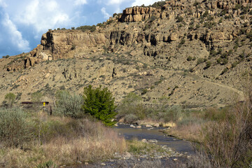 Wall Mural - Plateau Creek flows along the scenic byway past sheer cliffs on Grand Mesa in Colorado