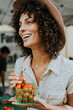 © Rawpixel.com - Beautiful woman buying tomatoes at a farmers market