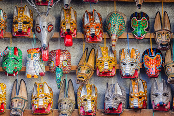 Carved wooden masks in a market in Guatemala