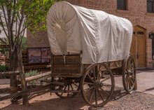 Traditional Horse Drawn Wagon With White Canvas Cover Used By Pioneers To Travel In The American Wild West