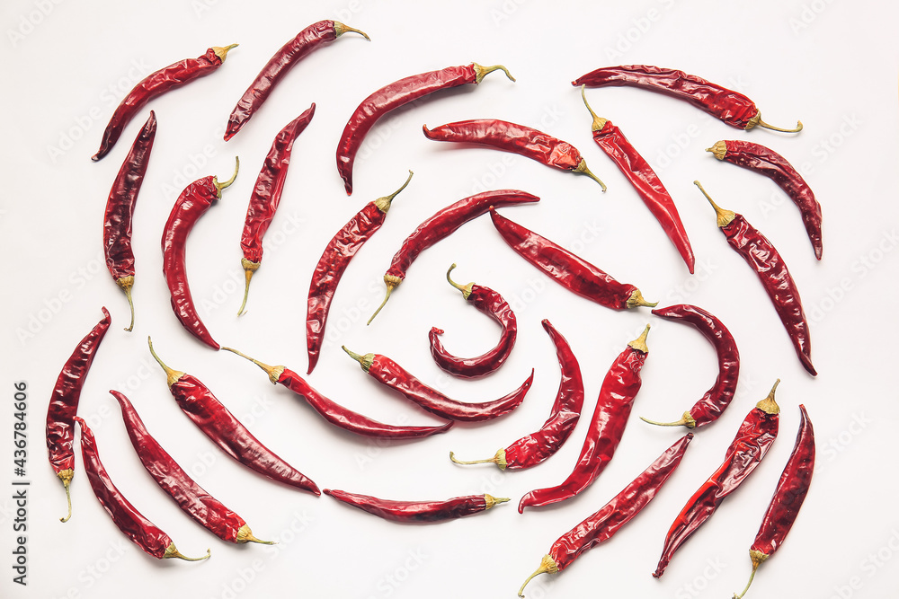 Dry hot chili peppers on white background