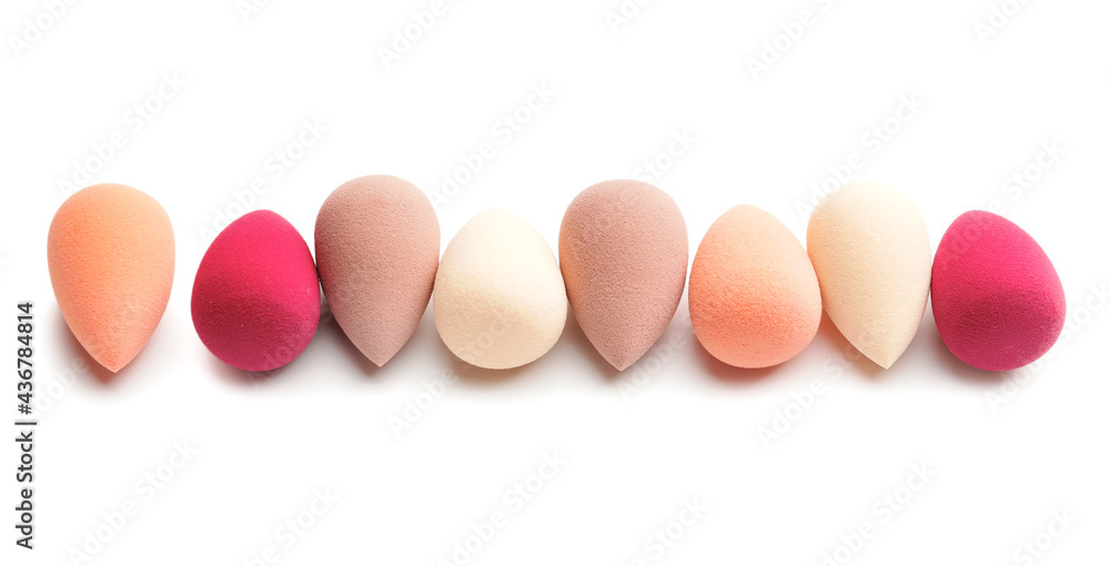 Makeup sponges on white background