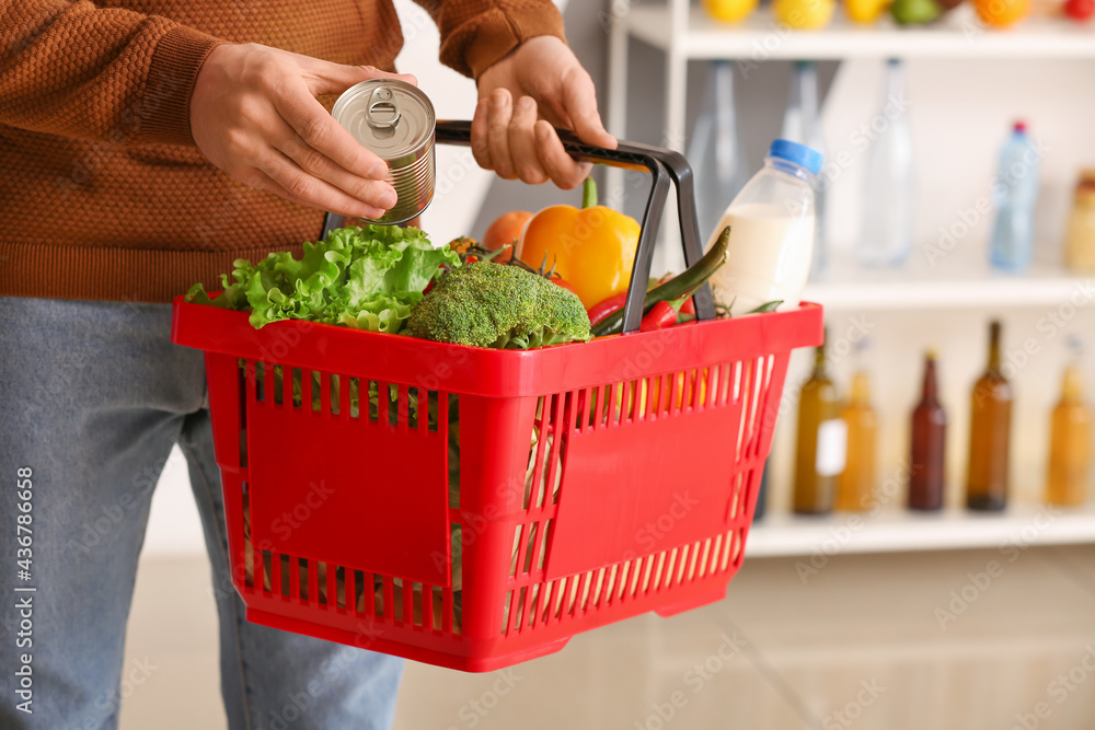 Man buying food in supermarket