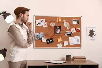 Wall Mural - Detective processing evidence in office