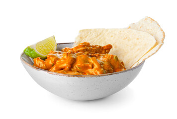 Bowl of tasty chicken tikka masala on white background